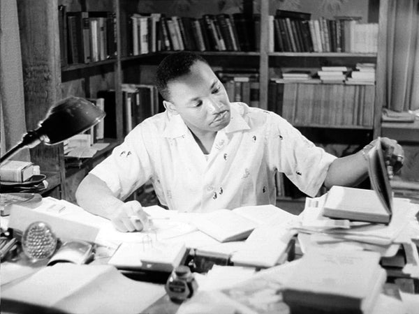 Martin Luther King Jr. working at his desk in home office in Montgomery, Alabama